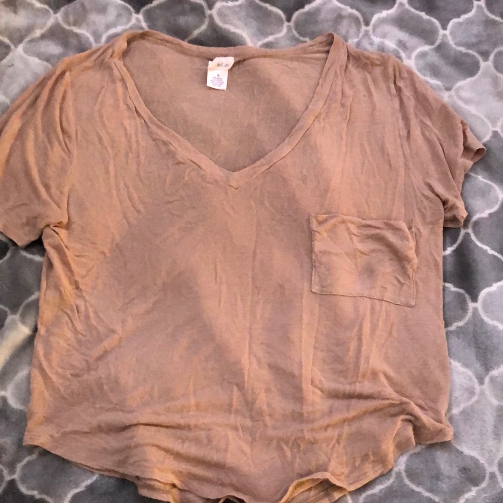 Light brown V-neck shirt